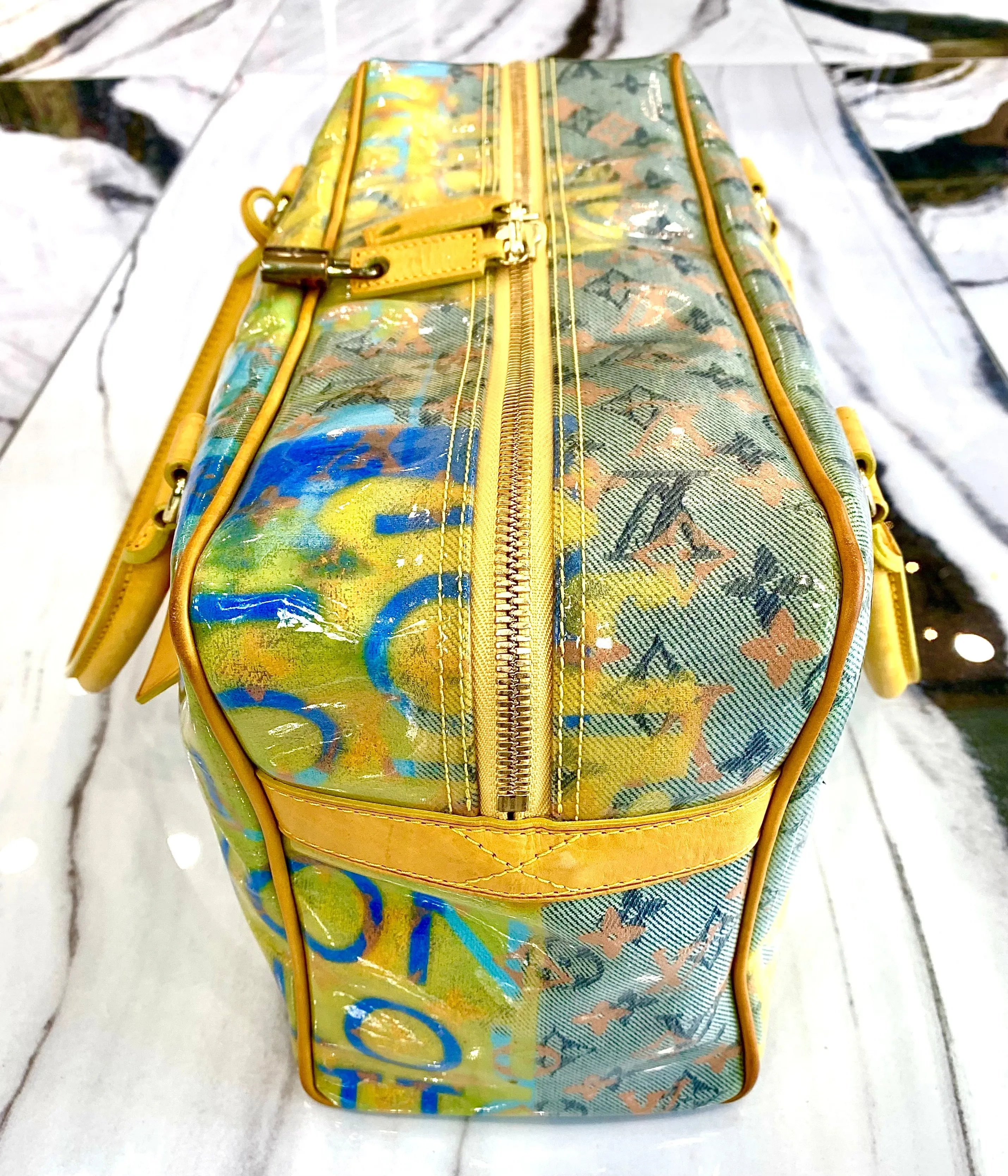LOUIS VUITTON MULTI-COLOR MONOGRAM PULP WEEKENDER PM