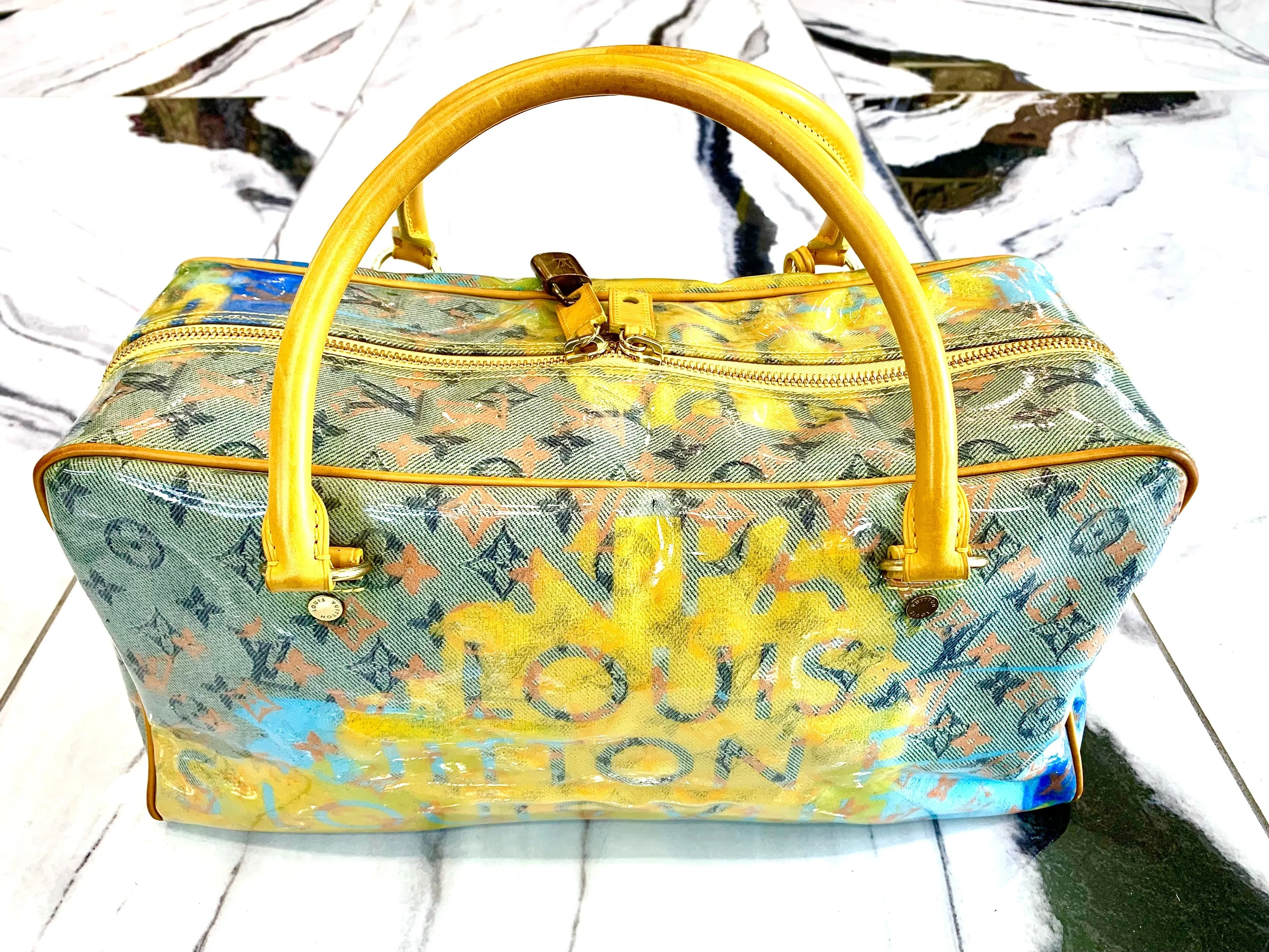 LOUIS VUITTON MULTI-COLOR MONOGRAM PULP WEEKENDER PM