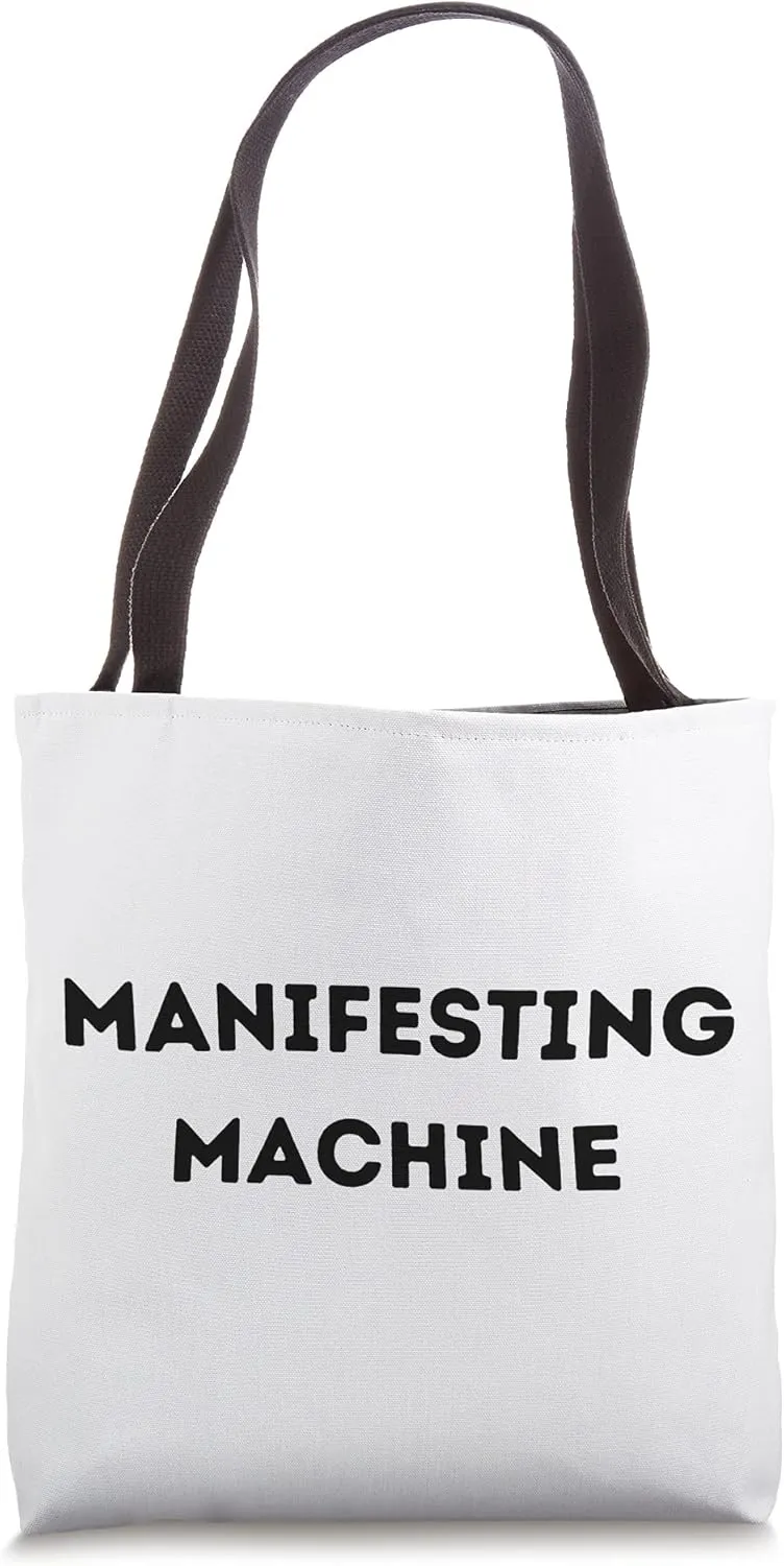 Manifesting Machine (Black Text) Tote Bag