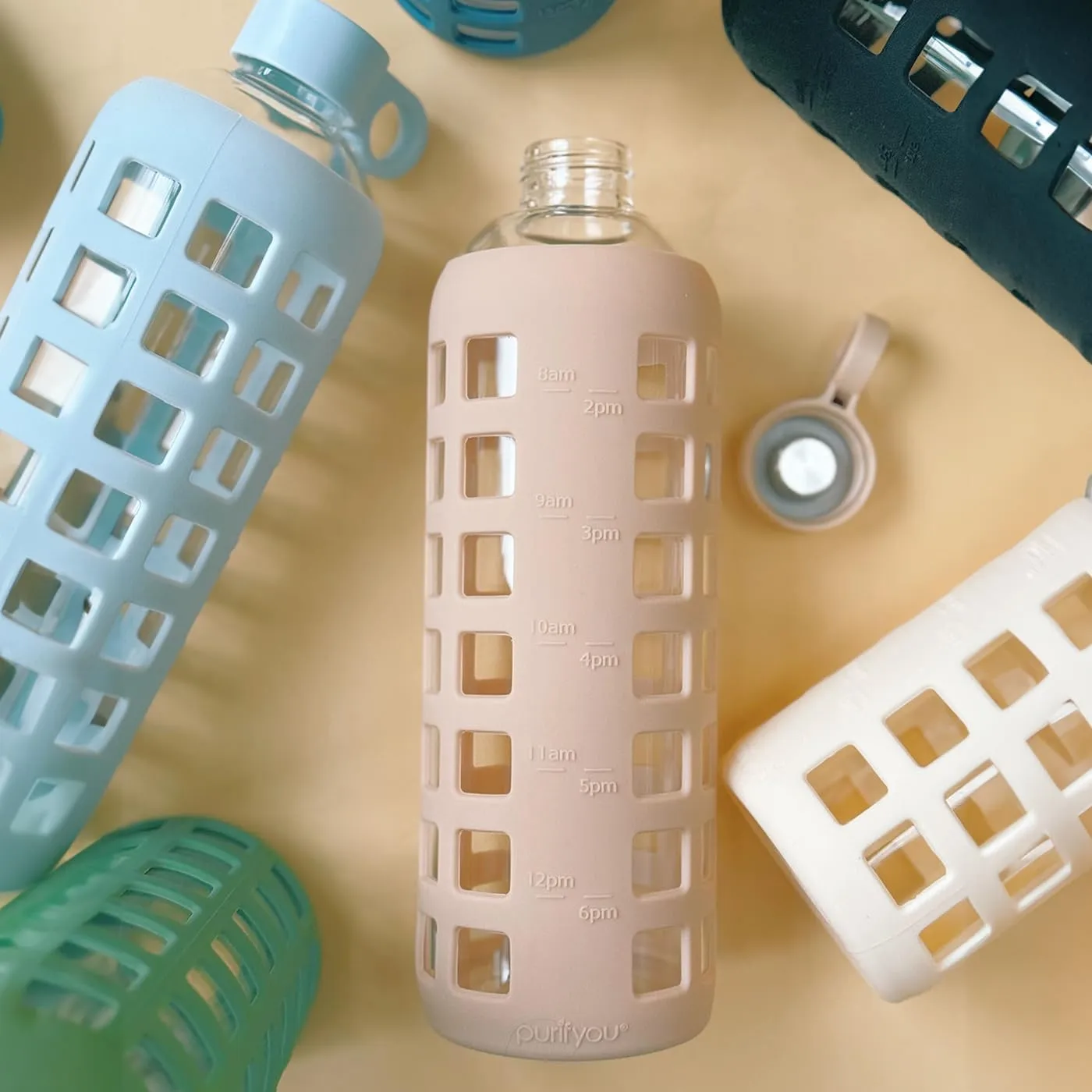 purifyou 40/32/22/12 oz Borosilicate Glass Water Bottles with Volume Markers, Silicone Sleeve, Stainless Steel Lid, Reusable Bottle for Water, Juice, Gym, and Fridge Storage (22oz Hazelnut)